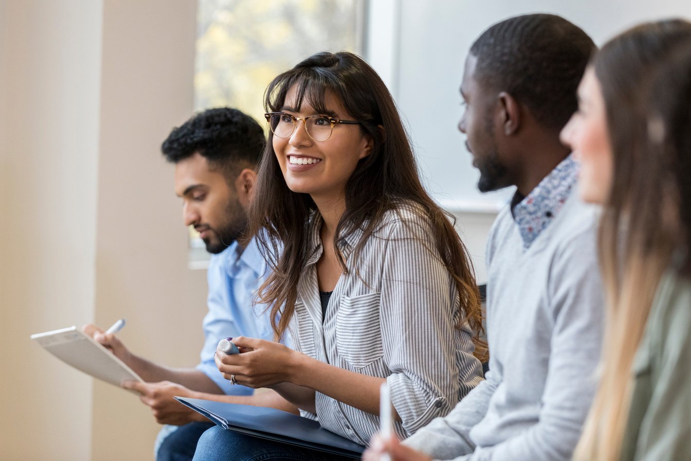 Young businesswoman enjoys employee training class